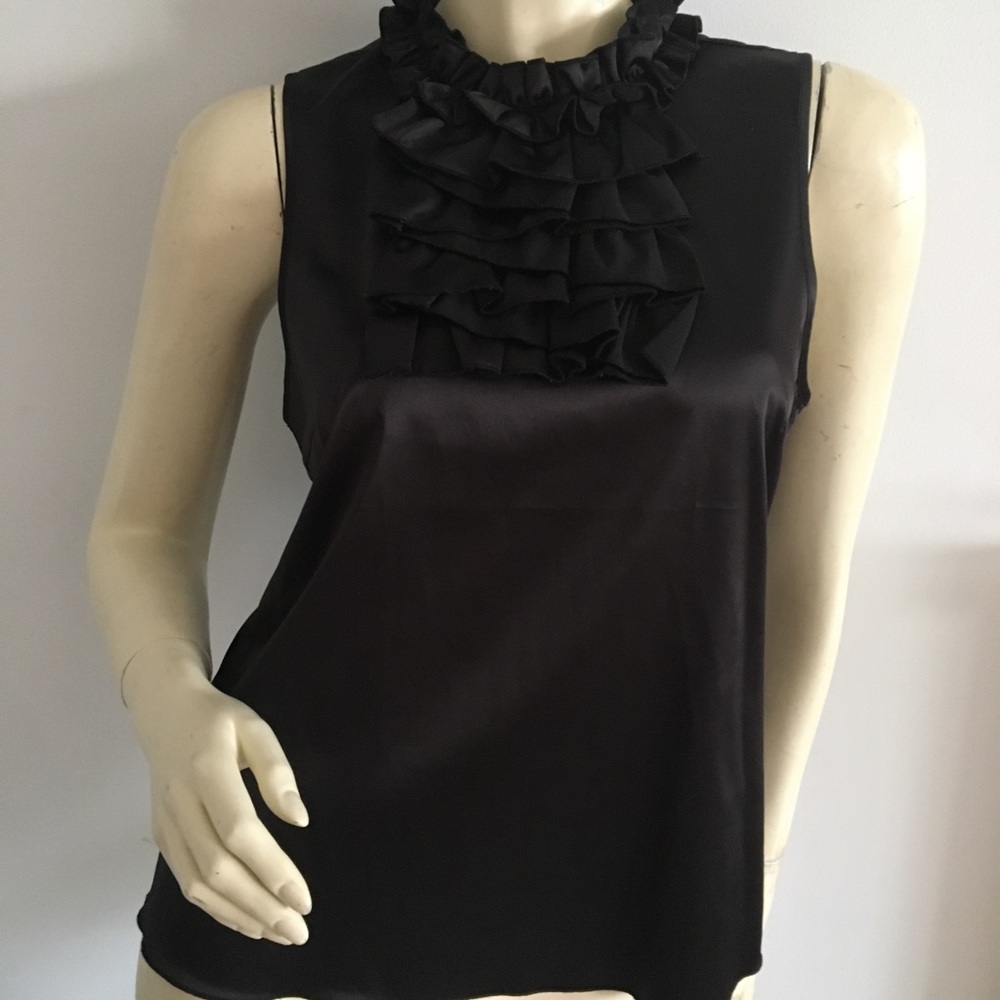 black sleeveless top with ruffle neckline